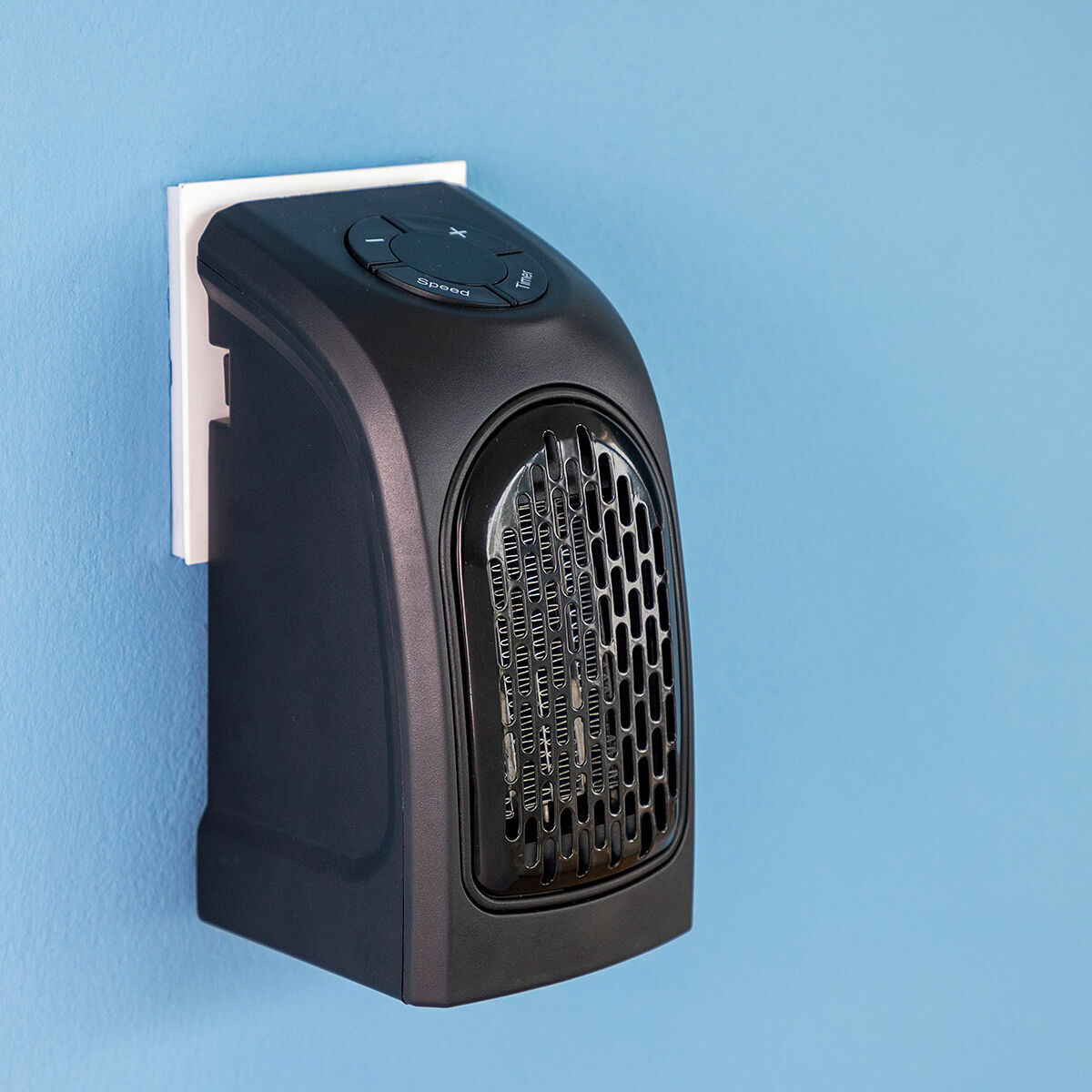 Mini-radiateur portable dans un bureau
